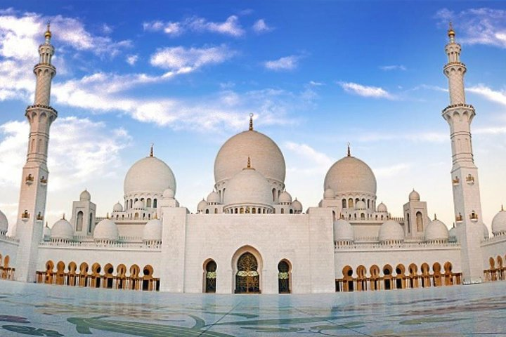 Explore the stunning architecture of the Sheikh Zayed Grand Mosque where intricate designs and serene surroundings create a memorable experience in Abu Dhabi a true highlight of the UAE capital.